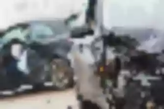 Two vehicles with severe front-end collision damage and deployed airbag, evidence for a car accident injury claim